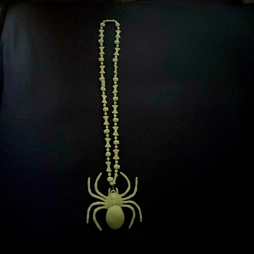 Halloween Spider and bones glow in the dark necklace.